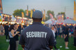 © Flex_Point_Security - A security guard is controlling the traffic and parking situation at an Asian festival in Canada.
