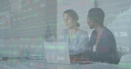 Poster - Animation of trading board over diverse female coworkers discussing reports on laptop in office