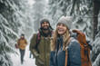 A young couple enjoys a snowy forest in Lapland