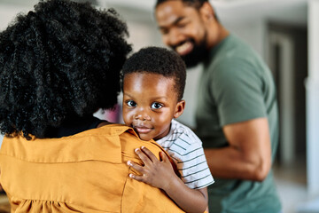 child family mother portrait father woman happy son man boy black american african smiling happiness love together parent cute hug kid little