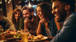 © Daniel - happy young people having dinner in the evening in a restaurant