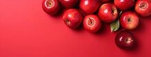Red Apples On Red Background