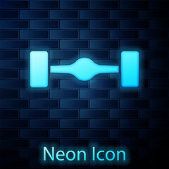 Poster - Glowing neon Chassis car icon isolated on brick wall background. Vector