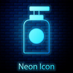 Sticker - Glowing neon Tube of hand cream icon isolated on brick wall background. Vector