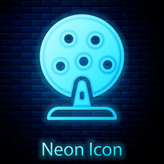 Sticker - Glowing neon Lottery machine with lottery balls inside icon isolated on brick wall background. Lotto bingo game of luck concept. Wheel drum leisure. Vector