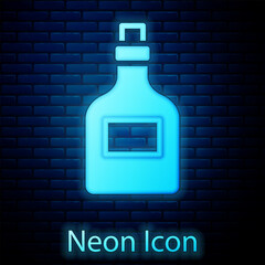 Poster - Glowing neon Alcohol drink Rum bottle icon isolated on brick wall background. Vector