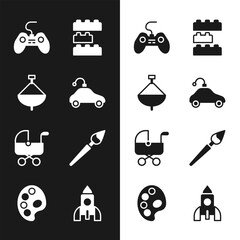 Poster - Set Radio controlled car toy, Whirligig, Gamepad, Toy building block bricks, Baby stroller, Paint brush, Rocket ship and Palette icon. Vector
