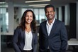 © yj - Happy confident international business team two Indian and American coworkers executive leaders standing in office. Smiling diverse workers in meeting room. generative AI