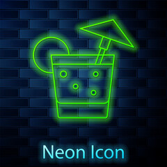 Poster - Glowing neon line Cocktail and alcohol drink with umbrella icon isolated on brick wall background. Vector