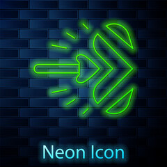 Poster - Glowing neon line Magic arrow icon isolated on brick wall background. Vector