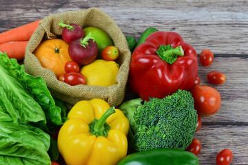 Healthy food background, healthy vegetarian food in paper bags, fruits and vegetables, banner copy space, supermarket shopping, food and clean vegetarian diet concept, organic fruits and vegetables co