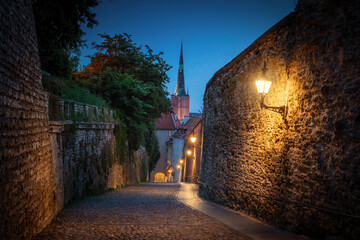 Sticker - Long Leg Gate Tower and St. Olaf church at night - Tallinn, Estonia