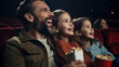 © Studio Nova - Family in a cinema watching a movie