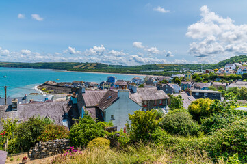 Wall Mural - A view down over the West Wales town of New Quay in summertime