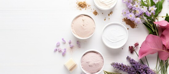 Aufkleber - Herbal flowers on a white wooden table accompany cosmetic product samples
