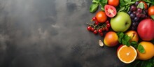 Top View Of Fresh Fruits And Vegetables On Concrete Background