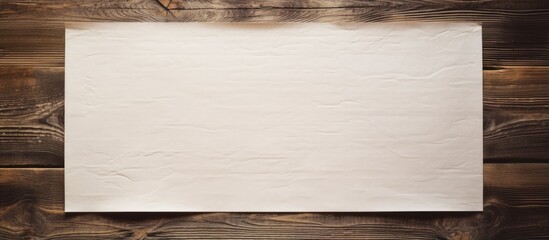 Wooden textured background with a paper sheet