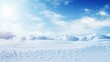 Winter snow background with snowdrifts, with beautiful light and snow flakes on the blue sky ,16:9, copy space