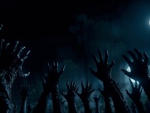 Halloween Zombie Hands Reaching Up From The Ground In A Foggy Graveyard At Night With Dark Blue And Black Tones