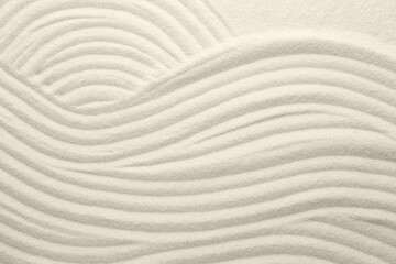 Wall Mural - White sand with pattern as background, top view. Concept of zen and harmony