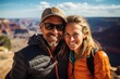 © Anne Schaum - Couple in their 40s smiling at the Grand Canyon in Arizona USA