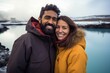 © Anne Schaum - Couple in their 30s smiling at the Blue Lagoon in Reykjavik Iceland