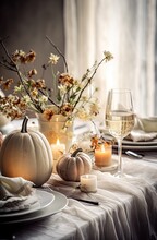 A Table Setting With Candles, Pumpkins And Flowers In Vases On The Dining Table For Thanksgiving Dinner Party