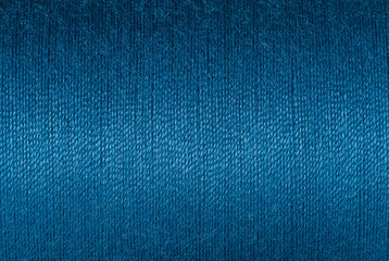 Abstract fabric texture background, close up picture of purssian blue color thread, macro image of textile surface, wallpaper template for banner, website, poster, backdrop.