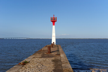 Wall Mural - Lighthouse of the Plomb harbor and  The Ré bridge in the Charente Maritime coast