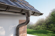 Close-up of the gutter, roof and corner of the house, 3D illustration