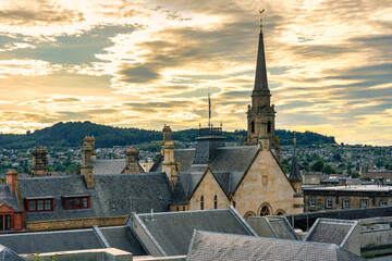 Cityscape of Inverness city at sunset with its medieval buildings and tall towers, Scotland.