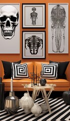 a living room with orange walls and black and white striped rugs, two framed art prints on the wall