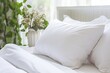 © LimeSky - White pillow on bed in bedroom closeup