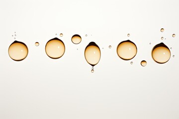 Sticker - Droplets of greasy fluid either organic or motor oil seen separately against a plain white backdrop