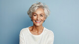 Fototapeta  - Beautiful gorgeous elderly woman 50s age senior model with grey hair laughing and smiling. Mature old lady close-up portrait. Healthy face skin care beauty, skincare cosmetics, dental, health.