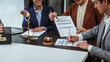 © Phushutter - Signing contract, Legal consultation, asian lawyers team meeting, contract finalization, lawyers discussing agreements, contract review session, agreement assessment, legal experts in conversation