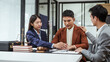 © Phushutter - consolation of Legal consultation, asian lawyers team meeting post-contract, contract finalization, discussing agreements, contract review session, agreement assessment, legal experts in conversation