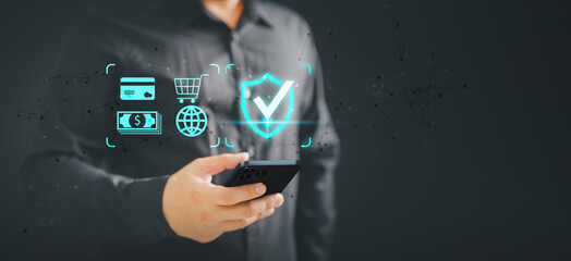 Fototapete - Customer use a mobile phone with the sign of security protection systems on virtual screen. Internet and Shopping online, Guarantee, Standards, Certified guarantee approval or secure access system.