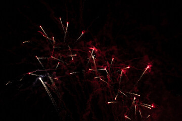 Fireworks sparkles on a black night sky