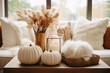 © barmaleeva - Fall decor in neutral colors. Poster, pumpkins, dry plants. Generative AI