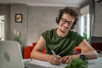 One man caucasian male freelancer work from home on laptop computer