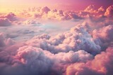 Fototapeta Niebo - Beautiful and dreamy fluffy pink clouds during fantasy sunset.