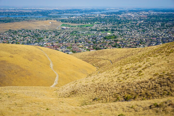 Hiking trail with Tri-Cities Washington in distance