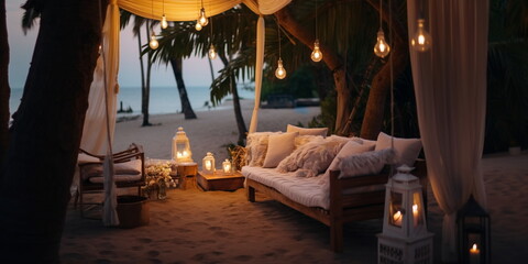 Wall Mural - cozy Luxury resort, evening beach, candles blurred light on table ,sofa, hammock on front sunset sea ,tropical plan and palm