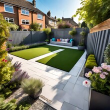 Luxury Home In The Garden ,A General View Of A Back Garden With Artificial Grass, Grey Paving Slab Patio, Flower Bed With Plants, Timber Fences, Blue Shed, Summer House Garden Timber .