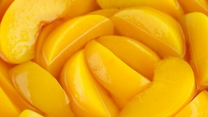 Wall Mural - Chopped yellow peaches in heavy syrup, canned fruit