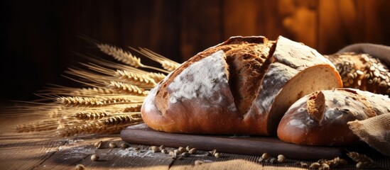Poster - Bread placed on table made of wood in background