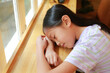 © zilvergolf - Cute Asian young girl kid sleeping on a book near the windows. Child with sweet dreams.