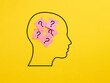 © Cagkan - Confusion, query and uncertainty concept. Sticky note papers in a human head with question mark symbols.
