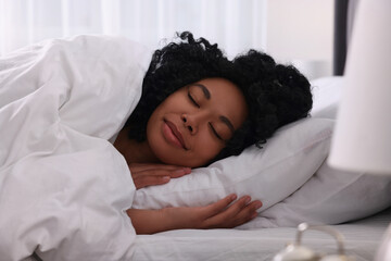 Poster - Beautiful young woman sleeping in soft bed